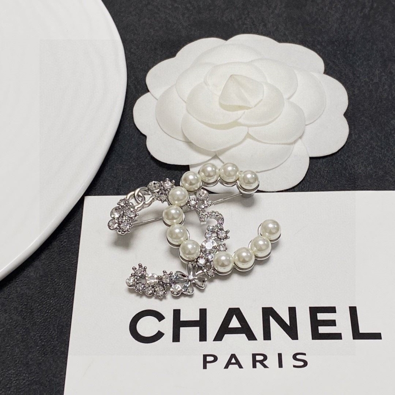 Ch**el brooches